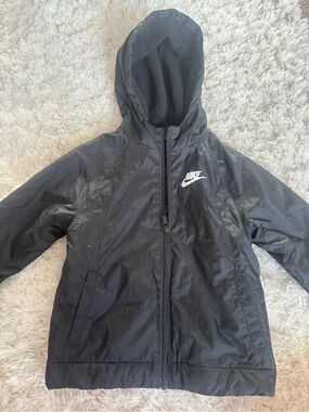 Nike Black Hooded Kids Rain Jacket with White Logo